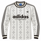 Buzo tejido blanco de Adidas Originals con rombos y letras negras al frente