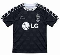 Front of the black América de Cali 2001 retro jersey by Kappa, with white LG and a tonal Kappa logo print