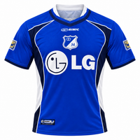 Frente de la camiseta retro azul de Millonarios 2003, Rinic, con LG al pecho y paneles laterales