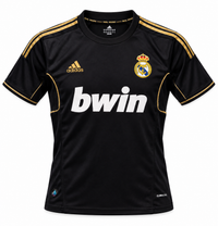 Black Real Madrid 2011/12 retro jersey with gold stripes and bwin in white
