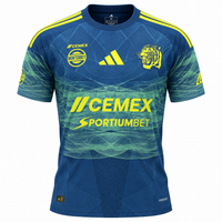 Camiseta tercera de Tigres UANL 26-27 azul con ondas verdes y CEMEX en amarillo