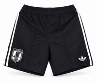 Black Japan shorts with three white stripes and JFA crest, the crest and the Adidas trefoil