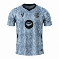 Camisa de goleiro do Barcelona 26-27 com escudo e logos termocolados