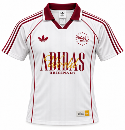 Camiseta Adidas World Wide blanca con cuello polo, el trébol y ADIDAS en letras grandes al pecho