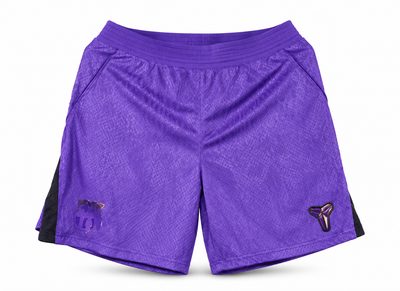 Purple Barcelona shorts with black panels and Kobe logo, the crest and the Nike logo