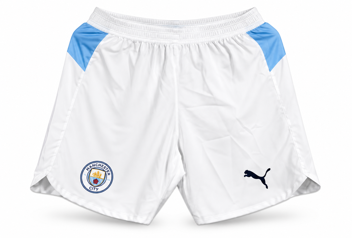White Manchester City shorts with sky blue waist details, the crest and the Puma logo